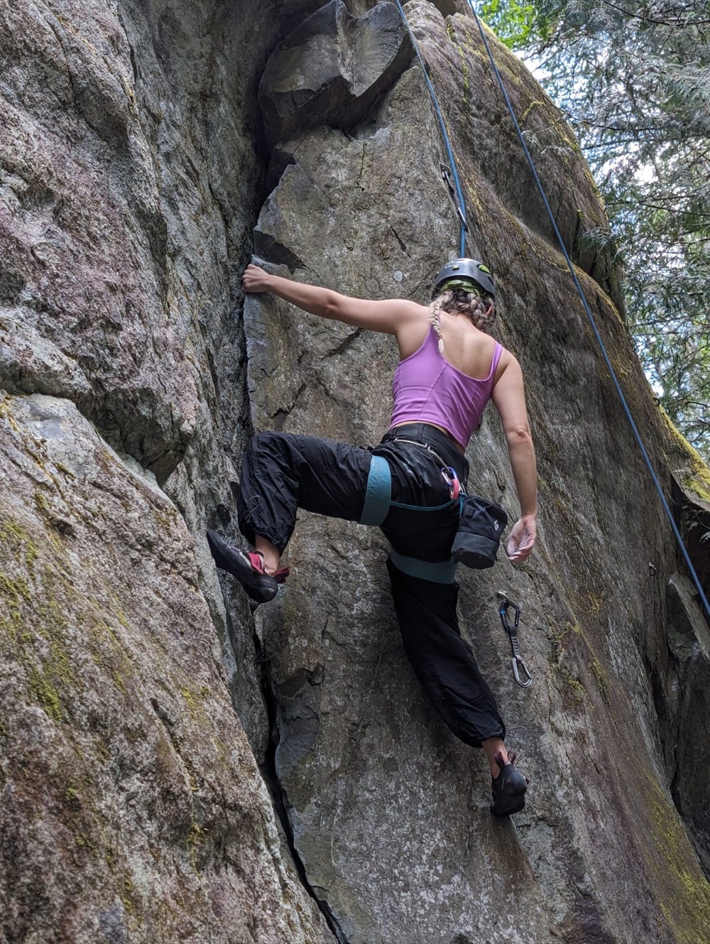 Bri rock climbing